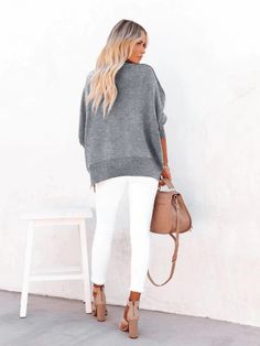 Update your knitwear collection with this oversized sweater boasting a relaxed silhouette and a smoke grey tone. Size Guide: Model is 5’6” tall, and has a 33.5” bust, 24.8”waist, & 37.4” hips. She is wearing a S / US 4 / AU 8. This sweater is true to size. Material: 100% acrylic. Care Instructions: Machine wash / Cold hand wash Knitwear Collection, Grey Knit Sweater, Daily Dress, Oversized Sweater, Batwing Sleeve, Bat Wings, Leather Ankle Boots, Grey Sweater, Black Sweaters