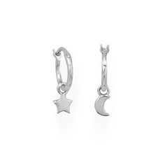 Playful mismatched earrings! Rhodium plated sterling silver 1mm x 11mm click hoop earrings feature tiny moon and star charms. Charms measure approximately 5.5mm across. .925 Sterling Silver Circle Charm Necklace, Star Charm Necklace, Moon And Star Earrings, Hoop Charms, Star And Moon, Mismatched Earrings, Moon And Star, Silver Moon, Moon Earrings