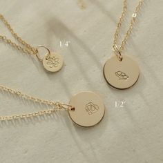 Adorned with hand-stamped Birth Flower designs, our stackable necklace captures the essence of meaningful moments. Personalize each disc with your birth month flower or gift it as a sweet token for mothers or grandmothers. Crafted with care, each disc symbolizes the cherished bond between mother and child, ensuring a heartfelt connection with every wear. Handcrafted in U.S.A Details Hypoallergenic, Water Resistant, Tarnish-free Material : 14k Gold Filled Disc Diameters: 1/4" , 1/2" Each necklace Stackable Necklaces, Birth Flower Necklace, 40th Gifts, Birth Month Flower, 20 Gifts, Month Flowers, Beaded Cuff, Birth Month Flowers, 30 Gifts