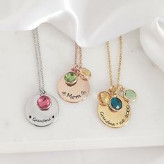 "Round necklace with your kids birthstones, the dainty coin can be engraved with names and symbols,  a great gift for mom, new moms, sister and grandma, you can purchase the necklace with up to 10 birthstones of your choice. The necklace is engraved on the front only, if you want a message engraved on the back you can purchase the extra side engraving following this link, please select the option TEXT: https://www.etsy.com/ca/listing/1516288937/add-on-personalization-engraving?click_key=ddc4ed739d39c0ce77e302cba362f062a9e68b2e%3A1516288937&click_sum=6c692b9f&ga_search_query=add%2Bon&ref=shop_items_search_3&frs=1&crt=1 We engrave each item in our studio, using a laser engraving process that creates a very precise and detailed image, the machine creates a darker tone image with no ink, this Grandma Necklace Birthstone, Grandma Jewelry, Birthstone Jewelry Mothers, Mom Necklace Personalized, Grandma Necklace, Personalized Grandma Gifts, Mama Necklace, Zodiac Sign Necklace, Family Necklace