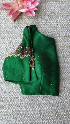 Hand embroidered ready made saree blouse / crop top/stitched saree blouse usa / green checks saree blouse/ hand embroidered blouse/zardosi blouse/green saree high neck blouse/dark red pure silk blouse/green maggam work blouse        It is very true that a perfect blouse is the one which makes your saree look stand out !! If you find one of such a style that you have been wanting to have then dont let it go !! we carry such unique trending blouses that instantly add a stylish look to any saree !!     Well..!! we understand that you may not get in your desired size/pattern, here you go with customization according to your size/pattern which we can deliver in 1-2 weeks of time period !!      Here is a beautiful Hand embroidered saree blouse in green color that has simple jewel inspired embroi Fitted Green Choli With Floral Embroidery, Festive Green Embroidered Fitted Top, Festive Green Embroidered Floral Top, Festive Green Floral Embroidered Top, Festive Fitted Green Embroidered Top, Fitted Green Embroidered Top For Festive Occasions, Festive Green Fitted Embroidered Top, Green Floral Embroidered Raw Silk Traditional Wear, Green Raw Silk Traditional Wear With Floral Embroidery