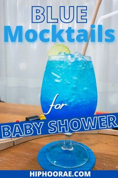 the blue cocktail is ready to be served for baby showerers with text overlay that reads, blue mocko cocktails for baby showerers