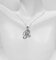 925 Sterling silver CZ initials Charm Pendents small, neat and fancy letter charm Initials featured, fancy script design, Cz setting with Rhodium finished It will be friends, sister, birthday, Christmas gift. made : 925 Genuine Sterling Silver (Not silver plated, Nor silver coated) with Rhodium finished size : 17.4mm x 20.8mm (0.69 inch x 0.82 inch) Sterling Silver Initial Pendant Charms For Anniversary, Sterling Silver Engraved Initial Pendant Charm, Elegant Sterling Silver Initials Charms, Nickel-free Sterling Silver Initial Pendant Jewelry, Nickel-free Silver Initial Pendant Charms, Script Design, Sterling Silver Toe Rings, Fancy Script, Silver Jewelry Box