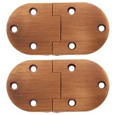 pair of brass plated door hinges with holes on each side for easy installation