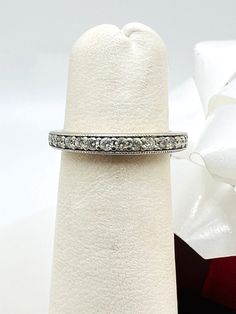 14K White Gold Diamond 0.20ct Band Ring size 4 This is a perfect gift for your loved one for any special occasion or holiday!  Total Diamond: 0.20ct Ring length: 18.56mm Ring width: 19.03 mm Total ring weigh: 1.72g Item will be placed into a gift box. * Classic Stackable Rings With Pave Setting, Classic Diamond Eternity Band With Vs Clarity, Round Eternity Band With Pave Setting For Anniversary, Stackable Diamond Rings With Vs Clarity In Round Cut, Classic Eternity Band With Pave Setting For Anniversary, Classic Cubic Zirconia Stackable Rings For Anniversary, White Gold Pave Setting Eternity Band For Anniversary, Elegant Diamond Eternity Band With Vs Clarity, Formal Stackable Rings With Pave Setting