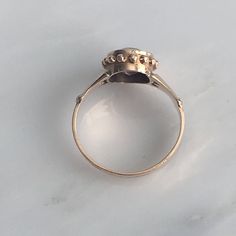 Details: Lovely Victorian Rose Gold Amethyst ring in 10k Gold. This piece is so sweet, and in remarkable condition. It is very feminine and has lovely details. There are no markings on the inside of the band. Measurements: Ring is a size US 6 and can be sized for a fee. The band itself is 2.9mm in width, and the setting including the amethyst is 11mm x 9mm (the amethyst measures 8.75mm x 6.75mm). Condition: The overall all condition of this ring is excellent. Please ask all questions prior to pl Antique 14k Gold Moonstone Wedding Ring, Heirloom 14k Gold Solitaire Amethyst Ring, Heirloom Yellow Gold Solitaire Amethyst Ring, Heirloom Yellow Gold Amethyst Solitaire Ring, Heirloom Amethyst Solitaire Ring In Yellow Gold, Heirloom 14k Gold Round Cut Amethyst Ring, Victorian 14k Gold Moonstone Ring For Anniversary, Purple Rose Cut Diamond Rings In 14k Gold, Purple 14k Gold Ring With Rose Cut Diamonds