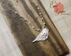 "This fine silver floral bird necklace is a show stopper. The delicate filigree pattern in the bird is oxidized to a lovely dark color to bring out the design. The bird is suspended from a row of white freshwater pearls and a delicate sterling silver chain. The bird is handmade using precious metal clay that is fired leaving the end result of only fine silver (.999), all other pieces are fully sterling silver (.925). Necklace arrives neatly packaged and ready to wear and enjoy, or give as a gift Precious Metal Clay Jewelry, Filigree Pattern, Metal Clay Jewelry, Precious Metal Clay, Bird Necklace, Bird Pendant, Cameo Necklace, Sterling Silver Cuff Bracelet, Silver 925 Necklace