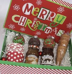 an open christmas gift box filled with condiments