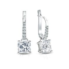 Dangle studs 4-Prong Basket set diamond earrings make a stylish statement in beauty. These 14k white gold diamond earrings sparkle with a 2.00 ct. cushion-cut natural diamonds as center stone and 0.10 ct. total weight of small round diamonds as side stone, together with a total weight of 2.10 ct. in lever back clasps. Cushion Cut Earrings, Black Diamond Pendant, Black Diamond Studs, White Gold Diamond Earrings, Solitaire Diamond Pendant, Colored Diamond Rings, Diamond Dangle Earrings, Black Diamond Ring, Sparkle Earrings