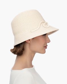 Express your sweet side with this simple, traditional cloche hat of Squishee® featuring an embroidered, feminine front bow motif. This hat can be rolled up for travel without losing its shape. Bow Cloche embodies the perfect craftsmanship and sun protection that Javits hats are known for. Blocks 95% of UVA/UVB rays Awarded the highest rating of UPF 50+ Signature logo on the back of the crown Embroidered braid bow detail Lightweight and packable Elasticized inner band fits most Handmade in USA Elegant Boater Hat With Upf 50+ And Short Brim, Elegant Short Brim Boater Hat With Upf 50+, Elegant Sun Hat For Kentucky Derby Travel, Elegant Sun Hat For Travel And Kentucky Derby, Elegant Sun Hat With Upf 50+ For Kentucky Derby, Elegant Hats With Upf 50+ And Short Brim, Elegant Fedora Sun Hat With Upf 50+, Elegant Brimmed Sun Hat With Uv Protection, Elegant Sun Hat With Upf 50+ And Curved Brim