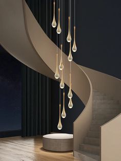 a spiral staircase with chandeliers hanging from it