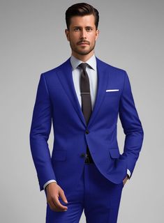 Explore a whole new world of fashion and define your presence in our immaculate Scabal Cobalt Blue Wool Suit. Crafted from pure wool, this blue suit gives off a sense of not only style but also professionalism and competency, earning you an added level of respect. The cobalt blue color will make you feel confident about yourself. Simply team it up with a white formal shirt, printed tie, and polished black shoes to complete this eye-catching look.   Look Includes   Scabal Cobalt Blue Wool Fabric  Two Button Jacket Style  Notch Lapel  Horn Royal Black Buttons  Single Vent  Three Cuff Buttons  Two Welted Back Pockets on Trousers    Click 'Customize Now' to modify the look if needed.   Lining: 100% Viscose, Dry Clean. Blue Slim Fit Suits With Notch Lapel, Blue Slim Fit Suit In Suiting Fabric, Blue Slim Fit Suits In Suiting Fabric, Blue Three-piece Suit With Notch Lapel For Business Casual, Blue Fitted Suit With Notch Lapel, Blue Slim Fit Suits With Welt Pockets, Slim Fit Blue Suit With Pressed Crease, Blue Slim Fit Suit With Pressed Crease, Blue Slim Fit Suits With Pressed Crease