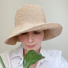 Our wide brim raffia hat crochet of paper rope yarn. It`s natural fiber - cellulose Floppy bucket hat is soft, but sturdy, flexible, light weighted, foldable and washable! Trendy sun hat is a great handmade gift for women any age. more crochet bucket hat here https://etsy.me/3GyieCJ our colorful crochet bags here https://etsy.me/3mXZ93a Main photo shows straw yellow floppy hat Sizes: 6⅞, 7, 7⅛ US, (XS, S, M) for head circumference 22`` (55-57 cm) 7¼, 7⅜ US, (L, XL) for head circumference 23`` (58-59 cm) XXL for big head (60-61 cm) CARE: hand washable in water 40 C. Dry flat. Special designs can be created by combining different colors according to the customer's specifications. Custom orders are welcome! Crochet summer panama produced and packed in non-smoking, pet free studio. Real item c Natural Woven Fedora, Natural Wide Brim Toquilla Straw Bucket Hat, Wide Brim Natural Woven Bucket Hat, Natural Woven Wide Brim Bucket Hat, Wide Brim Woven Bucket Hat In Natural, Straw Crochet Hats, Casual Crochet Hat With Short Brim In Natural Color, Casual Natural Crochet Hat With Short Brim, Natural Straw Bucket Hat With Curved Brim