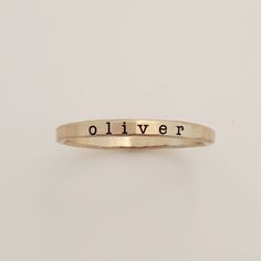 Add a touch of individuality to your jewelry collection with the Typewriter Name Ring from Going Golden. Handcrafted in Brownsburg, Indiana, this ring is perfect for those who love a classic, typewriter-style font. Available in 14K gold-filled, fine silver, or rose gold, this ring offers 100x more solid gold than plated alternatives, ensuring it’s waterproof and tarnish-resistant. Each ring comes with a polishing pad and a gift box, making it a thoughtful gift for someone special or a delightful Hand Stamped 14k Gold Engraved Ring, Hand Stamped 14k Yellow Gold Engraved Ring, Minimalist Hand Stamped Yellow Gold Ring, 14k Yellow Gold Hand Stamped Engraved Ring, 14k Yellow Gold Engraved Ring With Hand Stamped Details, Personalized Dainty Gold Engraved Ring, Minimalist 14k Gold Hand Stamped Ring, Adjustable Gold Sterling Silver Engraved Ring, Tarnish Resistant Brass Engraved Ring For Gift