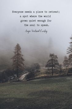 a foggy field with trees and a quote on it