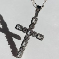 Introducing the exquisite Hope CZ Cross Necklace - a timeless symbol of faith and style. This stunning piece features a Large White Gold CZ Cross on a Sterling Silver Flat Figaro chain. This necklace is a must in your jewelry collection for all trendy & aesthetic wearers. Product Details: 16" 3.5mm Sterling Silver Flat Figaro Chain 60mm 24K White Gold CZ Cross Charm Not Water-Wearable Made in Scottsdale, AZ Fine Sterling Silver Crucifix Necklace, Sterling Silver Crucifix Necklace In Fine Jewelry Style, Crystal Cross Jewelry With Adjustable Chain, White Gold Cross Jewelry For Spiritual Style, Spiritual Crucifix Clavicle Chain Jewelry, Spiritual White Gold Cross Jewelry, Sterling Silver Clavicle Chain Crucifix Jewelry, Sterling Silver Crucifix Clavicle Chain, Diamond White Cross Pendant Jewelry