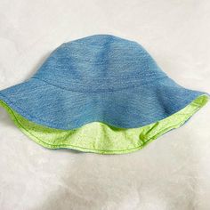 Denim Reversible Bucket Hat  ONLY ONE SIZE ~ 3-6 months. ~ 40 cm head size  ~Accessorize your little one with this cute denim and  cotton hat while also giving them sun protection. 🌤️ FEATURES ~reversible side in cotton pattern  ~optional patch to denim side  CHOOSE # ACCORDING TO IMAGE LISTED ~ 5cm sturdy brim ~lined to hide all seams for comfort Sewn one of a kind in California 🧵🪡 feel free to message me with any questions concerning size Cadeau Baby Shower, Baby Sun Hat, Kid Clothes, Cotton Hat, Gifted Kids, Baby Hats, Baby Shower Gift, Baby Gift, Favorite Things Gift