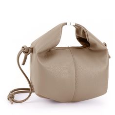 PRICES MAY VARY. 【Cruelty-Free Material】This dumpling shoulder bag is crafted from vegan leather that is both environmentally friendly and cruelty-free. If there is any smell, please ventilate it and leave it for a while to dissipate. 【Chic and Trendy Design】This chic luxury designer top handle handbag is crafted with PU fabric, featuring a stylish lychee grain leather design that adds a touch of sophistication to your look. 【Versatile Carrying Options】You can carry this vegan leather bag by han Modern Cream Hobo Bag With Detachable Handle, Everyday Faux Leather Shoulder Bag With Silver-tone Hardware, Everyday Shoulder Bag With Silver-tone Hardware And Faux Leather, Luxury Crossbody Hobo Bag With Silver-tone Hardware, Brown Crossbody Hobo Bag With Silver-tone Hardware, Designer Clutch, Pu Fabric, Top Handle Handbags, Vegan Leather Bag