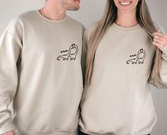 "Please note that the sweatshirts are sold separately. Dinosaur Sweatshirt, Christmas Couple, Honeymoon Sweatshirt, Matching Sweater, Valentines Day Gift, Funny Dinosaur Gifts, Dinosaur Birthday Our unisex sweatshirts are manufactured with premium quality materials, fits true to size and feels very soft and comfortable. Bella Canvas and Gildan branded.  Bella Canvas Sweatshirts material: - 52% airlume combed ringspun cotton / 48% polyester. -Soft feel fabric. -Drop shoulder style. -Ribbed collar Matching Sweaters For Couples, Honeymoon Sweatshirt, Sweat Couple, Couple Sweaters, Couple Honeymoon, Dinosaur Sweatshirt, Sweater Couple, Funny Dinosaur, Dinosaur Funny