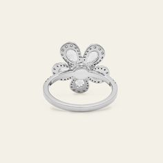 A mix of luminous diamond cuts forms a hypnotic bloom in the Diamond Forget-Me-Knot Ring. Pear-shaped rose-cut diamonds individually surrounded with round diamond halos comprise the petals that emanate from a round diamond center stone. Further diamonds form a partial eternity style on the 18-karat white gold band. Snap up this flower that will never wilt and die. Details18K White Gold1.40 Carats of Diamonds5 Pear-Shaped Rose-Cut Diamonds Totaling 0.81 Carats80 Round Diamonds Totaling 0.59 Carat Fall Rings, Knot Ring, Bespoke Jewellery, White Gold Band, Fine Jewelry Collection, Pinky Ring, Rose Cut Diamond, High Jewelry, Gold Band