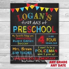 a chalkboard sign with the words logan's first day of school