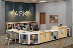 an office with desks, chairs and bookshelves in front of a sign that says ask