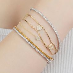 Enhance your wrist game with our Personalized Citrine Tennis Bracelet! Skillfully crafted in 14K/18K Yellow Gold, this Custom Stacking Bracelet is the perfect November Birthstone accessory. Handmade with love, it makes an ideal Cyber Sale gift. Shop now and elevate your style!𝐅𝐞𝐚𝐭𝐮𝐫𝐞𝐬:• 𝐌𝐚𝐝𝐞 𝐭𝐨 𝐎𝐫𝐝𝐞𝐫• 𝐌𝐞𝐭𝐚𝐥: 𝟏𝟒𝐊 | 𝟏𝟖𝐊• 𝐁𝐚𝐧𝐝 𝐂𝐨𝐥𝐨𝐫𝐬: Rose Gold, Yellow Gold & White Gold• 𝐂𝐮𝐬𝐭𝐨𝐦 𝐂𝐫𝐨𝐜𝐨𝐝𝐢𝐥𝐞 𝐋𝐨𝐜𝐤𝐒𝐭𝐨𝐧𝐞:• 𝐒𝐭𝐨𝐧𝐞 - Natural Citrine• 𝐒𝐡𝐚 Yellow Gold Cubic Zirconia Name Bracelet As Gift, Gold Stackable Cubic Zirconia Bracelets, Gold Cubic Zirconia Stackable Bracelets, Gold Stackable Bracelets With Cubic Zirconia, Rose Gold 14k Tennis Bracelet With 17 Jewels, Yellow Gold Cubic Zirconia Tarnish-resistant Bracelets, 14k Rose Gold Tennis Bracelet With Jewels, Tarnish Resistant Yellow Gold Cubic Zirconia Bracelets, Dainty Gold Stackable Diamond Bracelet