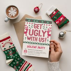 a person holding up a holiday party card next to christmas decorations and coffee mugs