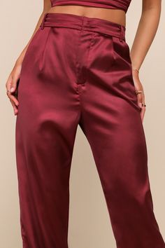 Even once all the holiday festivities are over, the Lulus Flawless Behavior Burgundy High Rise Straight Leg Pants are a chic look that can be styled over and over again! Sleek woven satin shapes these trendy pants that have a high-rise fit with a banded waist, belt loops, and a top clasp closure above a hidden zip fly. The straight pant legs feature pleated accents, diagonal front pockets, and full-length hems. Fit: This garment fits true to size. Length: Floor length. Size medium Inseam: 30.50 High Waisted Trouser Pants, Paper Bag Waist Pants, Lulu Pants, Burgundy Jeans, Trendy Pants, Straight Fit Pants, Lulu Fashion, Chic Look, Straight Leg Denim