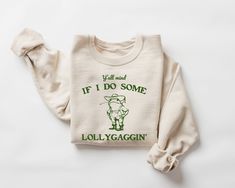 Y'all Mind If I Do Some Lollygagging Sweatshirt, Retro Frog And Toad Shirt, Cute Froggy,  Vintage Sweatshirt, Y2k Clothing 🛒👕 Welcome to LaBombaStore!  Here's your step-by-step guide to ordering: 1️⃣ Review all details before ordering. 2️⃣ Pick your sweatshirt  Size & Style from the dropdown menu. 3️⃣ Select your favorite color from the dropdown. 4️⃣ Want more? Hit 'back' & repeat steps 1-3. 5️⃣ When your cart's ready, add payment & shipping info, then hit submit. 📏 Not sure about size? Check Cute Froggy, Sweatshirt Y2k, Panda Tshirt, Retro Cartoon, Y2k Hoodie, Trash Panda, Meme Tshirts, Y2k Clothing, Retro Cartoons