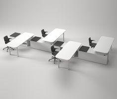 an office desk with three chairs and two tables on each side, all facing different directions