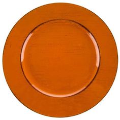 an orange plate on a white background