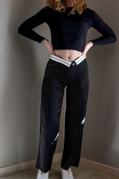 DetailsTailored Wide Leg Pants Pinstriped pattern Diagonal side pockets Mid waist Zip fly with concealed button Belt loops Mock welt back pockets with button Straight leg Content 97% Polyester 3% Spandex SizingModel is wearing a size Small. Height is 5'10", bust 34", waist 28" and hips 34". Runs true to size Non-stretch fabric Trendy Pinstripe Wide Leg Bottoms, Trendy Pinstripe Wide Leg Pants, Trendy High Waist Pinstripe Bottoms, Casual High Waist Pinstripe Pants, Fitted Pinstripe High Waist Bottoms, Fitted High Waist Pinstripe Bottoms, Fitted Striped Pants With Belt Loops, Pinstripe Wide Leg Pants With Pockets, Pinstripe Wide Leg Pants With Belt Loops