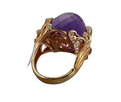 ~ Just purchased inventory of a high end boutique in Europe. All Carrera items are brand new/old stock, with tags removed for photographing. Current retails are significantly higher than noted on tags. Come with box and COA card ~ An 18k yellow gold ring set with a faceted amethyst and 0.84ctw of G/VS diamonds. DESIGNER: Carrera y Carrera MATERIAL: 18k Yellow Gold GEMSTONES: Amethyst, Diamonds - 0.84ctw DIMENSIONS: Ring Size 7.5. Top is 20mm x 25mm. MARKED/TESTED: CyC, Serial Number, 750 WEIGHT: Luxury Amethyst Gemstone Ring For Wedding, Luxury Oval Amethyst Ring For Formal Occasions, Luxury Collectible Rings, Luxury Gold Amethyst Ring With Center Stone, Luxury Amethyst Ring With Gemstone Accents As Gift, Luxury Amethyst Ring For Wedding With Polished Finish, Luxury Rings With Accent Stones, Exquisite Amethyst Ring With Gemstone Accents For Formal Occasions, Luxury Amethyst Ring Gift