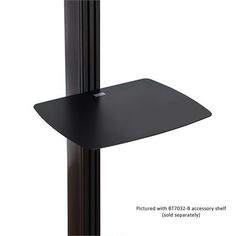 an image of a black shelf on the wall