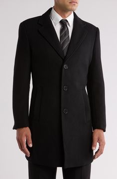 Crisp notched lapels framed a single-breasted jacket cut from a sumptuous wool blend for cool-weather comfort. Front button closure Notched lapels Front welt pockets Back vent Lined 45% polyester, 35% wool, 15% other fibers, 5% nylon Dry clean Imported Black Wool Coat With Concealed Placket And Lapel Collar, Black Wool Coat With Lapel Collar, Black Pea Coat With Lapel Collar And Concealed Placket, Black Wool Coat With Button Closure For Formal Occasions, Formal Black Single Breasted Wool Coat, Formal Black Single-breasted Wool Coat, Tailored Black Wool Coat With Double Button Closure, Black Formal Wool Coat With Button Closure, Formal Black Wool Coat With Button Closure