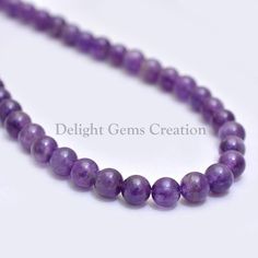 PRODUCT DETAIL :ITEM : AMETHYST BEADED NECKLACEITEM CODE :  DGC537ITEM NAME :NECKLACEGEMSTONE :  AMETHYSTBEADS SHAPE : SMOOTH ROUNDLENGTH :   18 INCH APPROXBEADS SIZE:  8-9 mm ApproxWEIGHT :  220 Cts. APPROXCUSTOMIZATION/BULK ORDER : AVAILABLEPLEASE FEEL FREE TO CONTACT IF YOU REQUIRE ANY FURTHER INFORMATION. Halloween Beaded Jewelry, Round Bead Necklace, Tigers Eye Necklace, Jewelry Statement, Amethyst Jewelry, Amethyst Beads, Matching Bracelets, Eye Necklace, Bulk Order