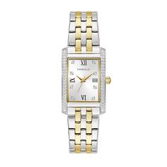 Enhance your everyday look with the refined elegance of this ladies' Caravelle by Bulova crystal accent two-toned watch. The silver-toned dial features gold-toned hands, black roman numeral markers, shimmering crystal accent markers and a gold-toned border. 21.5mm rectangular stainless steel case with curved mineral crystal and sparkling crystal-lined sides Japanese quartz movement keeps accurate time. The white and gold-toned ion-plated stainless steel link bracelet secures with a fold-over cla Bulova Watches Women, Unique Watches, Bulova Watches, Watches Unique, Roman Numeral, Two Tone Watch, Beautiful Watches, Sparkling Crystal, Christmas 2024