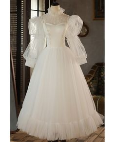 Get 10% off now! Buy retro beaded pearls tea length tulle wedding dress with high neck long sleeves at wholesale price online. Free shipping and pro custom service since 2009. Wedding Dress With High Neck, 50s Wedding Dress, Antique Wedding Dresses, 50s Wedding, Tea Length Tulle, Dress With High Neck, Wedding Dress Ivory, Long Wedding Dress, Bridal Gowns Vintage