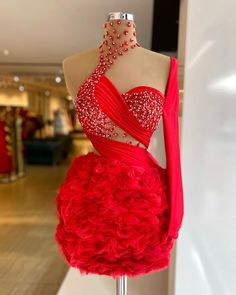 One sleeve, short red ruffle dress featuring front little red details. Short Red Prom Dresses, Tulle Cocktail Dress, Red Ruffle Dress, One Shoulder Prom Dress, Dresses Beautiful, Short Gowns, Classic Cocktail, Cocktail Gowns, Beaded Prom Dress