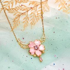 Cute Pink Clavicle Chain Jewelry, Pink Gold Flower Pendant Necklace As Gift, Pink Gold Flower Pendant Necklace Gift, Pink Pendant Charm Necklace, Cute Pink Jewelry As A Gift For Her, Pink Flower Pendant Necklace With Clavicle Chain, Pink Necklace With Adjustable Chain As A Gift, Pink Flower Pendant Clavicle Necklace, Pink Necklace With Adjustable Chain For Her