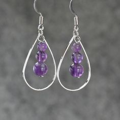 "The tear drop hoop earrings are handmade using amethyst, or coral, or turquoise. Free US shipping. Customers who purchased this item said: \"Very pretty, love these earrings \" The length of the earrings is 1 inches, or 2.5cm. (excluding the length of hook) Earrings are worn so close to the face, they are the most important accessories because it will siphon attention to our face. Earrings can compliment our face shape, enhance our good features, soften the jaw line, bring out the color of the Round Beaded Earrings With Natural Stones As Gift, Hoop Earrings With Round Natural Stones For Gift, Round Natural Stones Beaded Earrings As Gift, Crystal Hoop Earrings Gift, Hoop Crystal Earrings For Gifts, Adjustable Teardrop Pendant Earrings As Gift, Nickel-free Teardrop Spiritual Jewelry, Spiritual Teardrop Nickel-free Jewelry, Sterling Silver Wire Wrapped Crystal Earrings