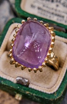 Yellow Gold Amethyst Ring With Rectangular Shape, Luxury Rectangular Amethyst Ring, Classic Rectangular Amethyst Ring, Vintage Amethyst Oval Cabochon Ring, Classic Cabochon Amethyst Ring, Classic Amethyst Cabochon Ring, Formal Heirloom Amethyst Cabochon Ring, Vintage Oval Cabochon Amethyst Ring Hallmarked, Vintage Amethyst Oval Cabochon Ring For Anniversary