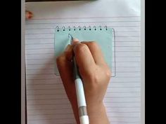 a person writing on a piece of paper with a pen in their left hand and an eraser next to it