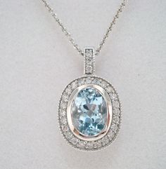 "HERE IS BEAUTIFUL HANDMADE PENDANT NECKLACE 14 KARAT WHITE GOLD AVAILABLE YELLOW OR ROSE GOLD TOO ASK ME PLEASE COMES WITH 16\" OR 18\" INCH CHAIN CENTER AQUAMARINE 1.10Ct !! CENTER IS BEZEL SET !! VERY SWEET AQUA COLOR & CLEAN AQUAMARINE CENTER SHAPE- OVAL CUT- VERY GOOD CLARITY- AAA COLOR- AQUA CARAT- 1.10ct MEASUREMENT- 8X6mm ALL ROUND & BELL 27 WHITE DIAMOND 0.25ct!! SI1 G COLOR TOTAL 1.35 CARAT FULL PAVE SET WITH MILLIGRAIN VERY CLEAN AND BRIGHT WHITE COLOR DIAMONDS RETAIL PRICE IS Exquisite Oval Necklace With Single Cut Diamonds, Exquisite Oval Diamond Necklace Gift, Exquisite Oval Diamond Necklaces, Exquisite Oval Diamond Necklace For Gift, Luxury Platinum Oval Necklace, Luxury Oval Platinum Necklace, White Oval Halo Setting Necklace, Luxury Oval Platinum Necklaces, Oval Diamond Necklace With Accents For Anniversary