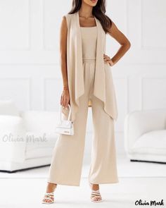 Olivia Mark - Three-Piece Ensemble: Sleeveless Camisole Top, Flared Leg Pants, and Matching Coat Cotton Sleeveless Jumpsuits And Rompers For Loungewear, Sleeveless Cotton Jumpsuits And Rompers For Loungewear, Beige Sleeveless Sets For Spring, Casual Sleeveless Set For Day Out, Chic Sleeveless Sets For Fall, Versatile Sleeveless Vest With Pockets, Chic Sleeveless Fall Sets, Fitted Sleeveless Sets For Fall, Sleeveless Denim Vest For Day Out