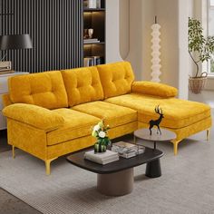 a living room with a yellow couch and coffee table