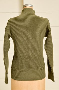 "1940s Deck Wool Sweater Army Green Knit Mock Turtleneck WWll High Neck Sweater USN deck sweater. Army green wool knit. Hand repair on front as shown. Measurements Shoulders: 18.5\" Chest: 40\" Length: 25\" Sleeve: 22\"" Vintage Solid Sweater With Ribbed Cuffs, Vintage Sweater For Fall, Solid Vintage Sweater For Fall, Vintage Solid Sweater For Fall, Vintage Solid Color Sweater For Fall, Vintage Wool Turtleneck Sweater, Vintage Khaki Tops For Winter, Vintage Wool Sweater For Workwear, High Neck Sweater