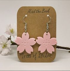 London spring is here with all the lovely cherry blossom trees. With this order you will get one of those cards for free. 🌸 Hooks: lead free, nickel free. Antique-silver-plating. Large pastel pink flower with some great detail.  Laser cut acrylic, 30 mm across. The surface on the back is smooth and shiny. Blossom Colored Flower Charm Earrings For Spring, Blossom Color Flower Charm Earrings For Spring, Blossom Flower Charm Earrings For Spring, Blossom Color Earrings With Flower Charm For Spring, Spring Pink Earrings With Flower Charm, Pink Flower Shaped Earrings For Spring, Pink Nickel-free Flower Earrings For Mother's Day, Trendy Spring Flower Earrings For Gift, Mother's Day Pink Nickel-free Flower Earrings