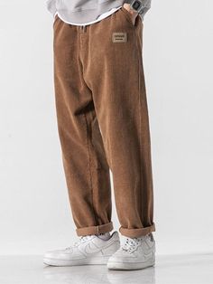 Add a cozy touch to your Soft Boy aesthetic with these Corduroy Jogger Pants. Crafted from premium cotton, the pants offer unbeatable comfort and style. The elasticated waist with a tie and ankle cuffs ensure a snug fit, while the cuffed hem adds a stylish twist. Featuring twin front pockets for added convenience, these joggers will quickly become your go-to choice for laid-back looks. Soft boy aesthetic Men's pants Elasticated ankle cuffs Elasticated waist with tie Cuffed hem Twin front pockets Cotton Corduroy material Cord Pants Outfit Men, Soft Boy Style, Japanese Trousers, Mens Casual Pants, Pants For Men Casual, Soft Boy Aesthetic, Comfort Clothing, Corduroy Pants Men, Pants For Boys